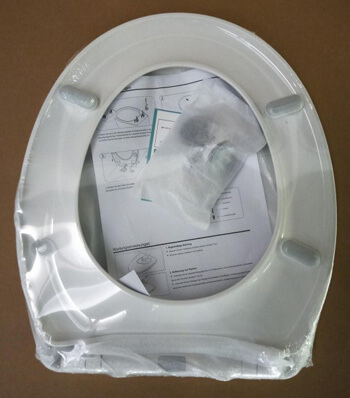 toilet seat with shrinking film toilet seat with shrinking film